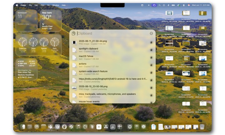 Käyttö Spotlight MacOS Tahoen sisällä MacBook Airissa.